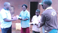 Distributing food parcels for poor families in the community